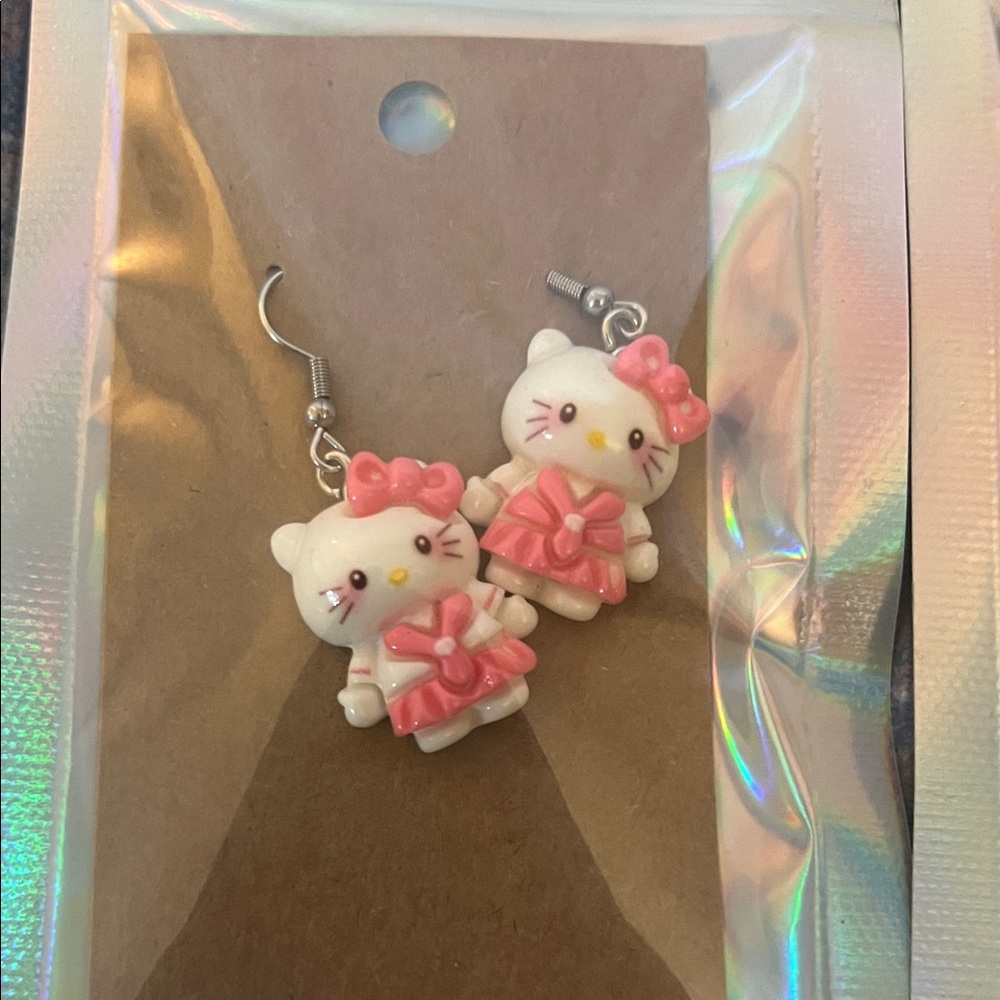 Two pairs of hello kitty earrings cute! - Picture 2 of 3